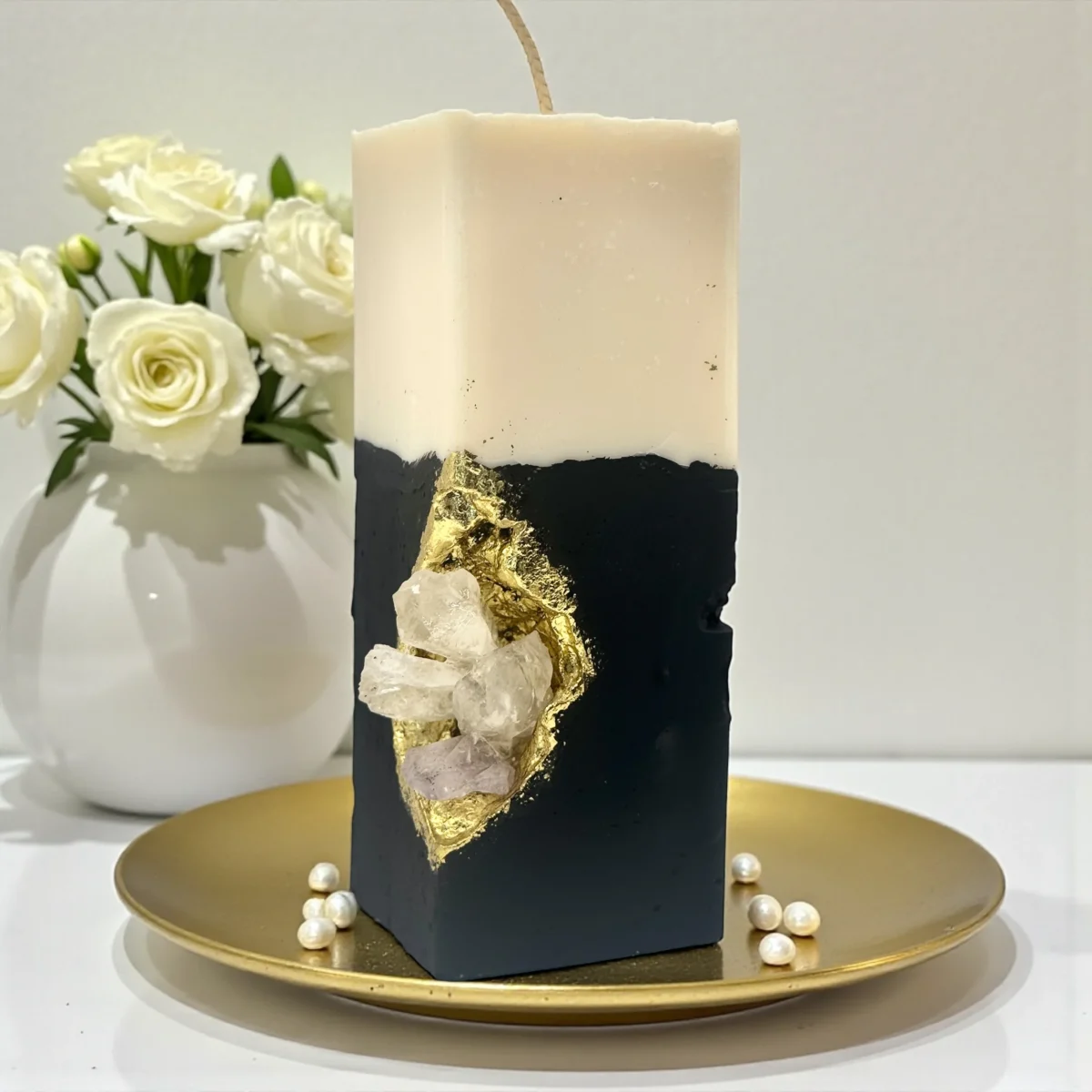 Devotion Luxury handmade crystal candle with natural gemstones, black sculpted base and gold accents, minimalist interior décor