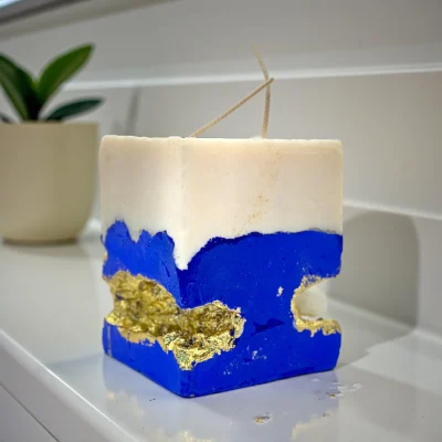 Silk Seduction handmade candle with white aragonite crystal, raw sculptural cement design