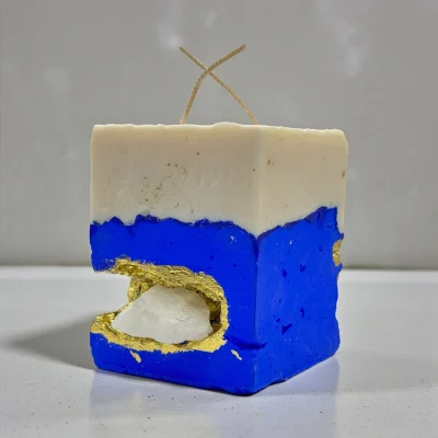 Silk Seduction handmade candle with white aragonite crystal, raw sculptural cement design
